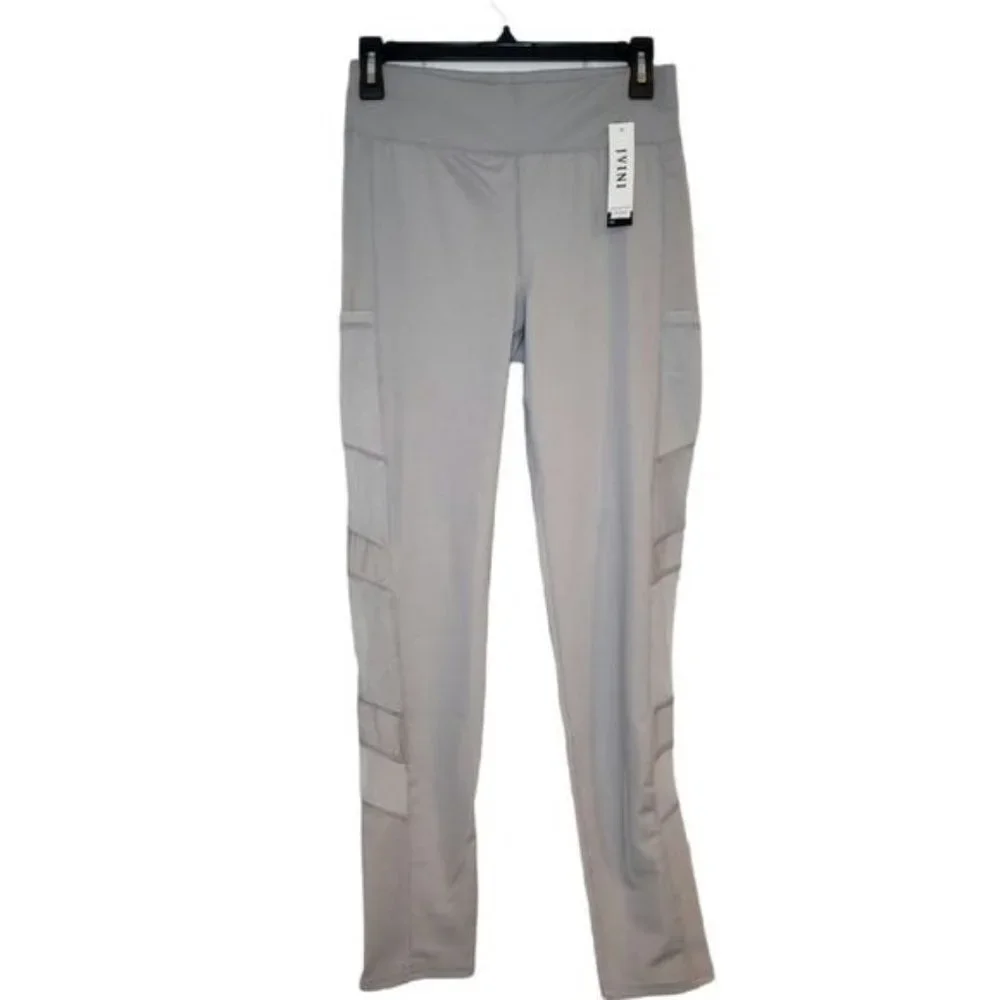 NWT JVINI gray leggings with sheer‎ side pa…